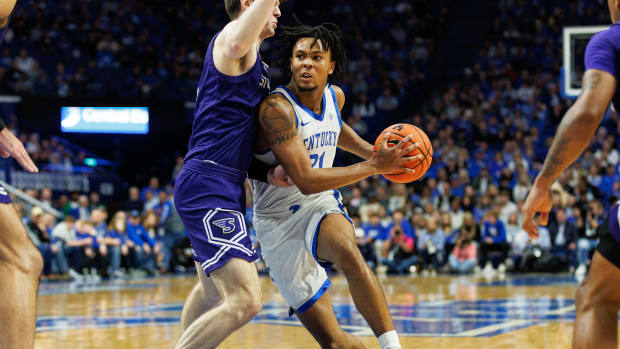 Nov 17, 2023; Lexington, Kentucky, USA; Kentucky Wildcats guard D.J. Wagner (21) drives to the basket during the second half against the Stonehill Skyhawks at Rupp Arena at Central Bank Center. Mandatory Credit: Jordan Prather-USA TODAY Sports